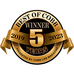 A gold and black badge featuring the text Best of Cobb, Winner 5 Years, 2019-2023, and Presented by Cobb Life Magazine, with a gold ribbon draped across.